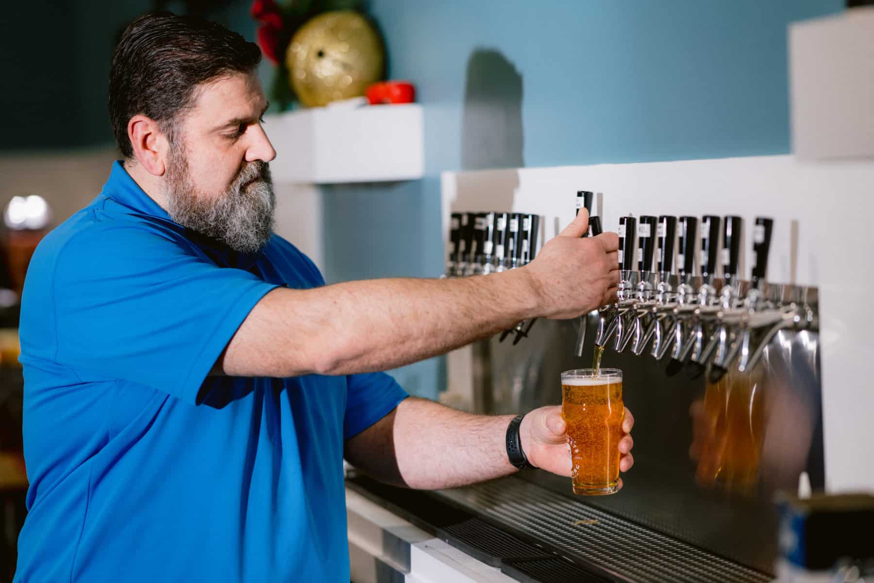 Owner of Twelve78 Brewing, Steve Rogacki, pours a beer for our Small Businesses of Phoenixville series