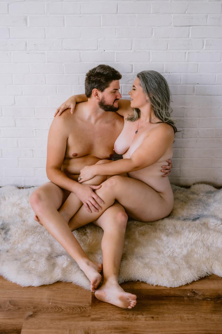 Fully nude boudoir couple