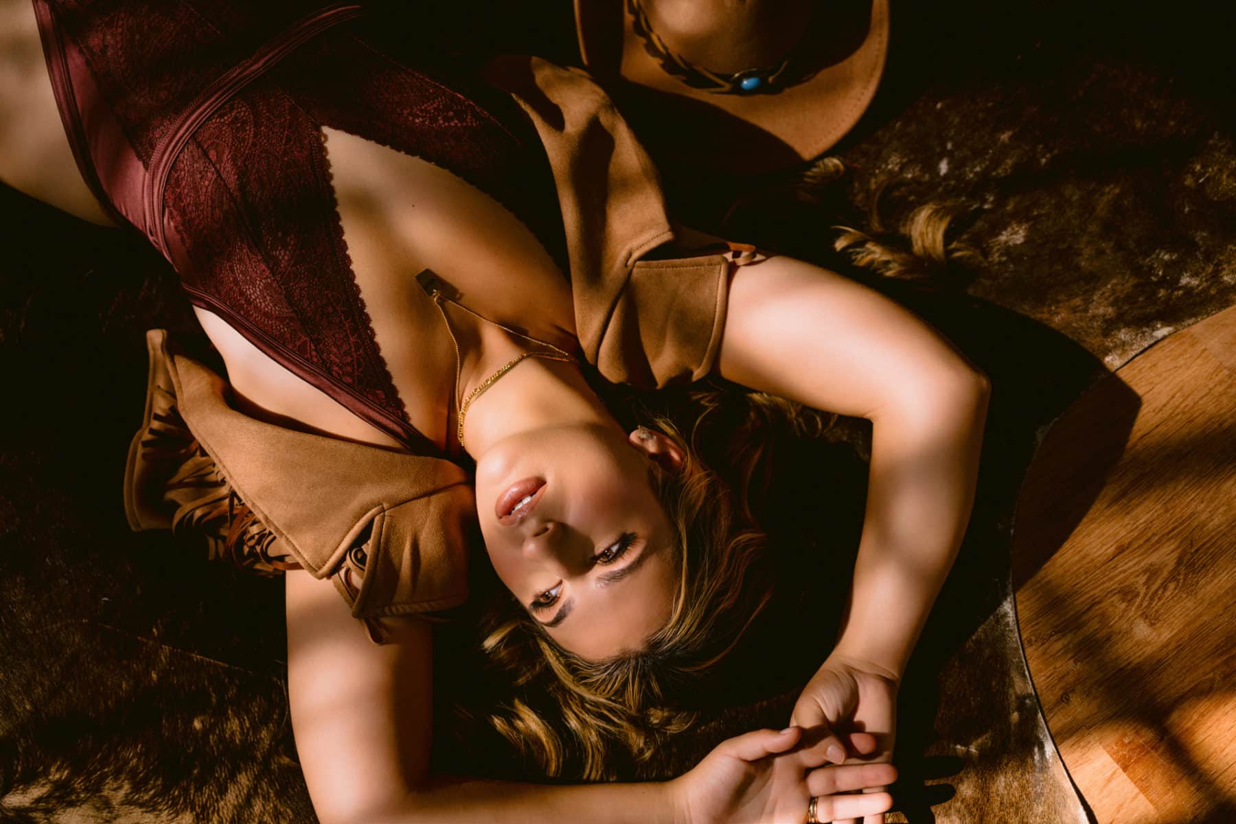 Cowgirl inspired boudoir session with confident mom after having a baby