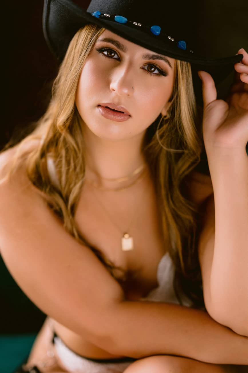 Boudoir after baby session with cowboy hat