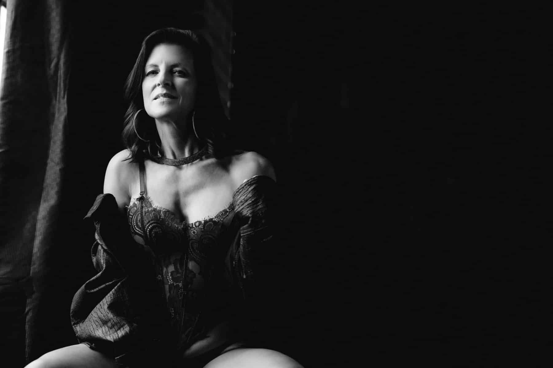 Beautiful boudoir image showing a woman embracing her true self