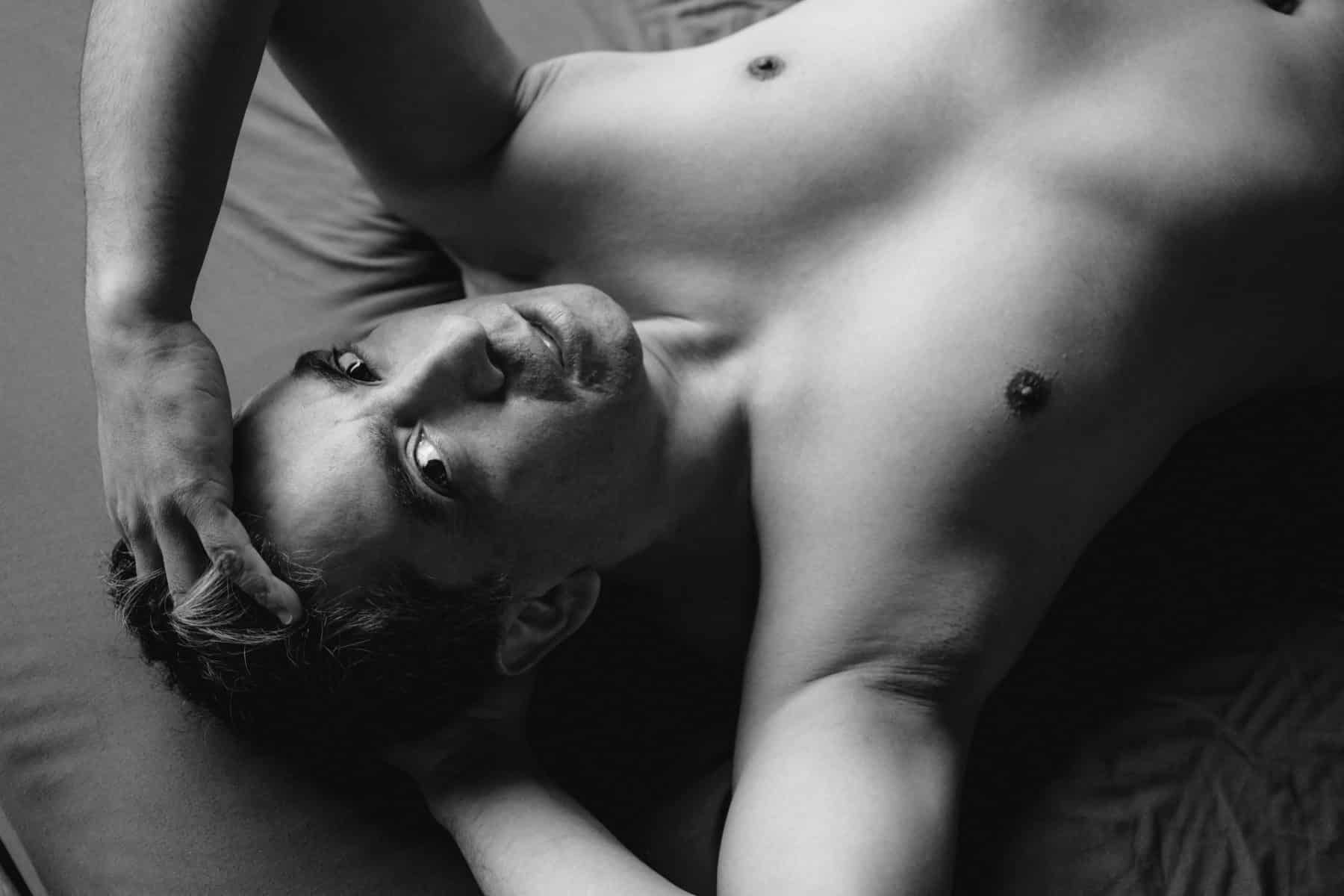 Men’s boudoir calendar feature: a stunning portrait of confidence and self-acceptance.