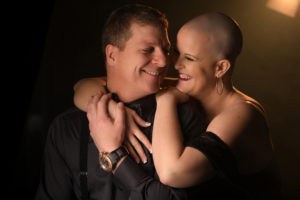 Couple laughing in photo studio